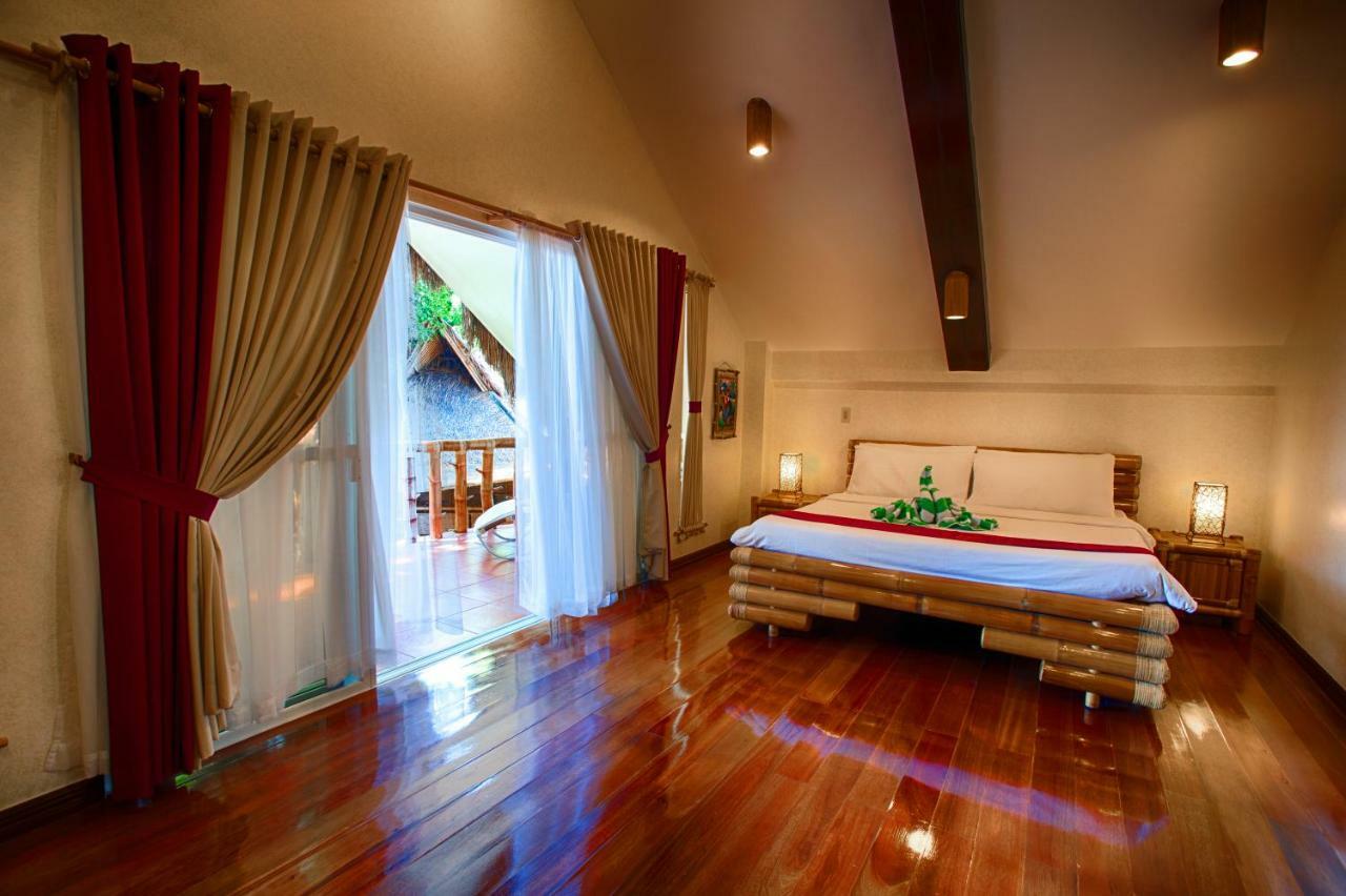 Pura Vida Beach & Dive Resort Dauin Bagian luar foto
